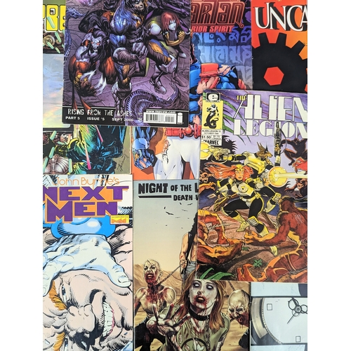 205 - A collection of vintage comic books, including DC Universe Sandman, Marvel Universe, Wolverine, etc