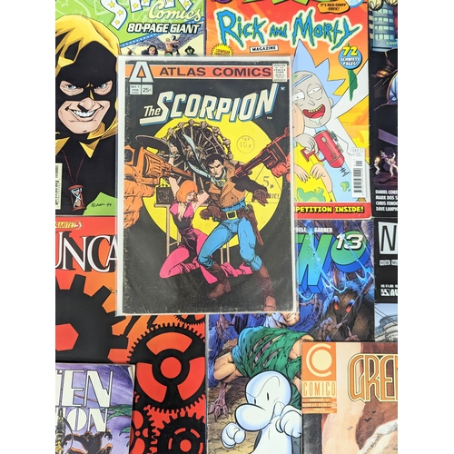 205 - A collection of vintage comic books, including DC Universe Sandman, Marvel Universe, Wolverine, etc