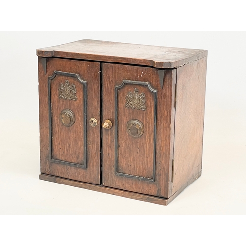 24 - A late Victorian oak table top cabinet with 3 interior drawers, in the style of a safe. By E.R. Moor... 