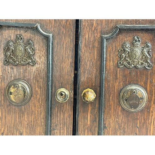 24 - A late Victorian oak table top cabinet with 3 interior drawers, in the style of a safe. By E.R. Moor... 