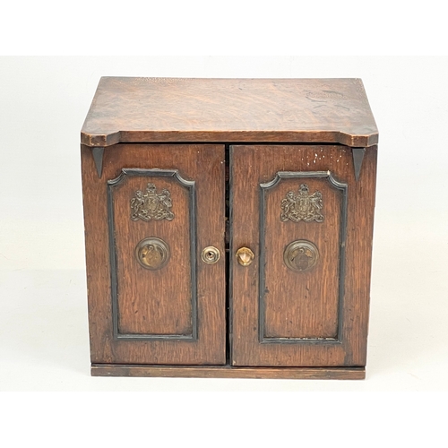 24 - A late Victorian oak table top cabinet with 3 interior drawers, in the style of a safe. By E.R. Moor... 