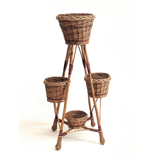 320 - A tall wicker plant stand. 96.5cm