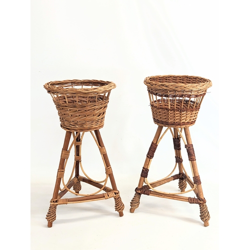 316 - A near pair of wicker plant stands. Tallest measures 56cm