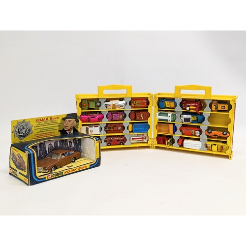 223 - A collectable Corgi Kojack Buick model car with a collection of Matchbox model cars and trucks in Pl... 