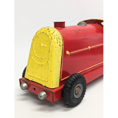 224 - A vintage tin Triang express steam train. 52cm in length