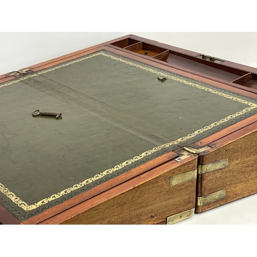 33 - A good quality Victorian mahogany brass bound writing slope with key. Open 50x53cm. Closed 50x26x17c... 