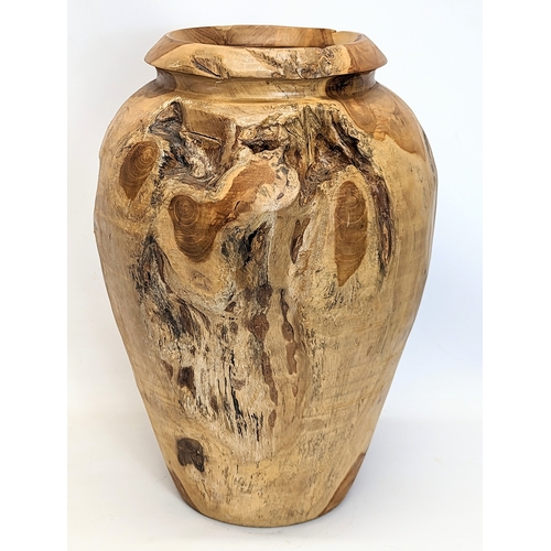 297 - A large yew wood vase. 44.5cm