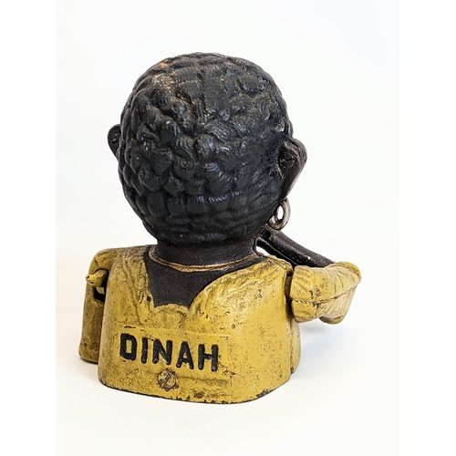 229 - A reproduction Dinah mechanical cast iron money box. 14x16.5cm