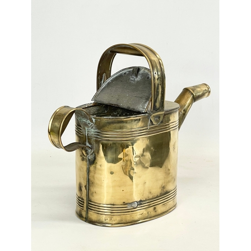 332 - A late Victorian R. Perry Son & Co small brass watering can. Circa 1900. 33x13x27cm