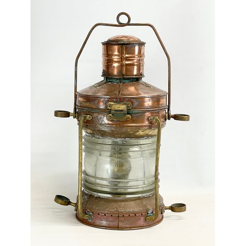 84 - A large 19th century copper and brass ships lantern by Ellermans Wilson Line LTD. Anchor. 40x25x55cm