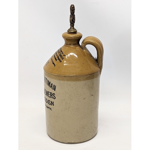 338 - A vintage stoneware bottle with stopper of Robbie Burns. 36cm