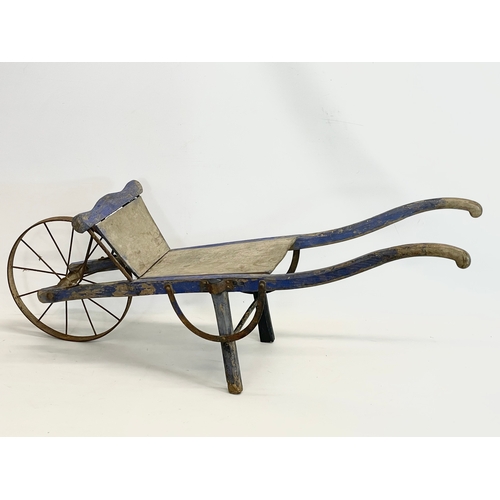 339 - A small early 20th century wooden barrow. 109x38.5x39.5cm