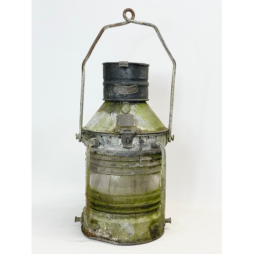 87 - A large late 19th/early 20th century ships lantern by Seahorse. 30x51cm not including handle.