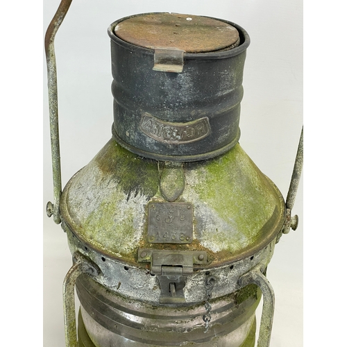 87 - A large late 19th/early 20th century ships lantern by Seahorse. 30x51cm not including handle.