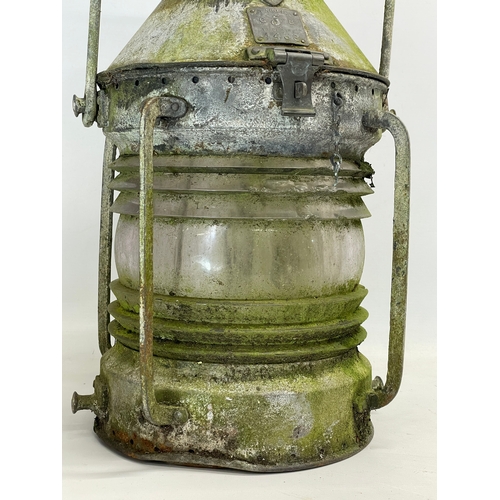 87 - A large late 19th/early 20th century ships lantern by Seahorse. 30x51cm not including handle.