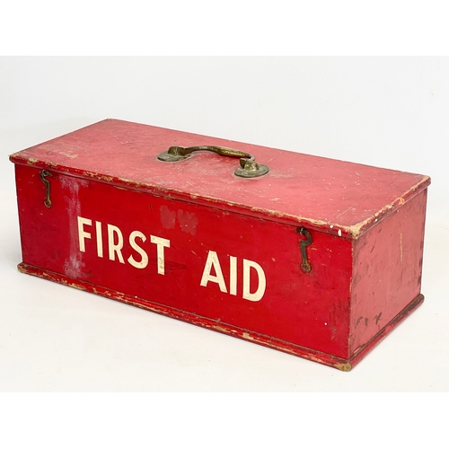 341 - A vintage wooden First Aid box. 54x22x18cm