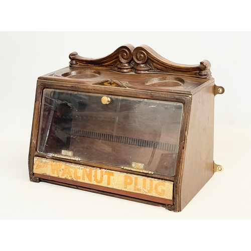 142 - A vintage shops cigar display cabinet, with enamel Smoke Walnut Plug advertising. 29x31x21cm