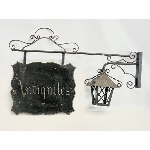 141 - A large early 20th century Wright iron double sided ‘Antique Shop’ sign. 101x68cm