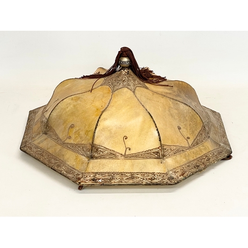 147 - A vintage Middle Eastern style soft leather light shade. 48.5x21cm