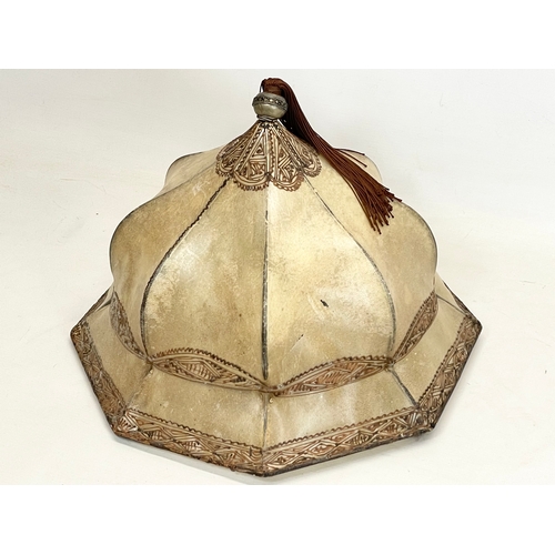 148 - A vintage Middle Eastern style soft leather light shade. 39x28cm