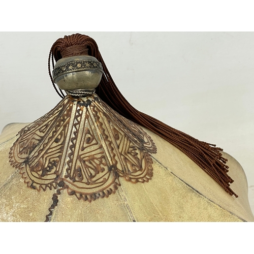 148 - A vintage Middle Eastern style soft leather light shade. 39x28cm