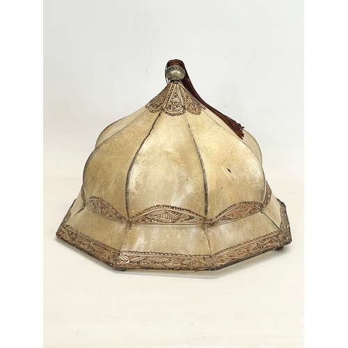 148 - A vintage Middle Eastern style soft leather light shade. 39x28cm