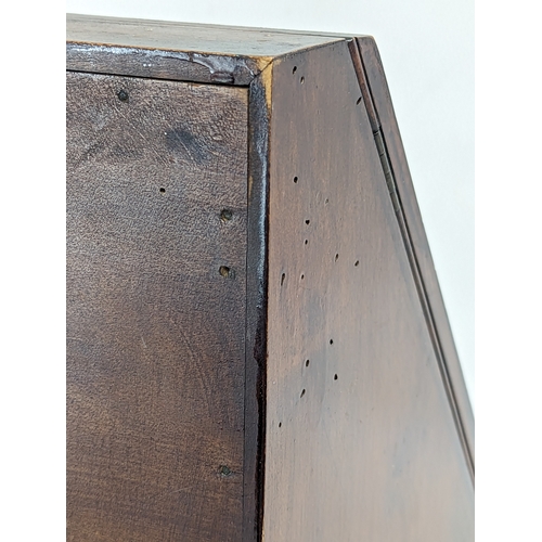 149 - An Edwardian mahogany desk top organiser, with painted panel. 40x2537cm