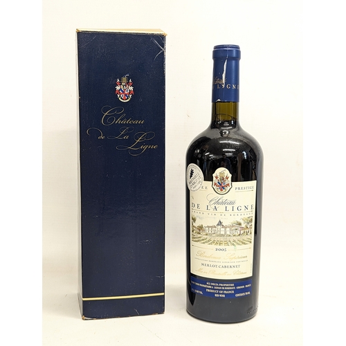 191 - An unopened bottle of Chateau De La Ligne, Merlot-Cabernet, 2003, in box.