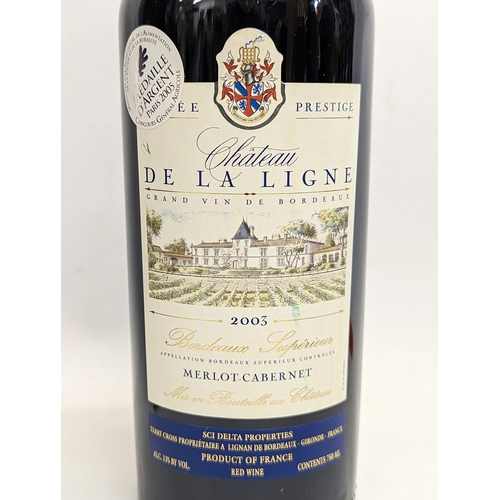 191 - An unopened bottle of Chateau De La Ligne, Merlot-Cabernet, 2003, in box.