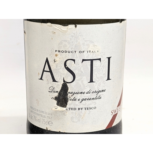 194 - 2 unopened bottles of wine, Beaujolais-Villages, 2014, France and Asti, product of Italy.