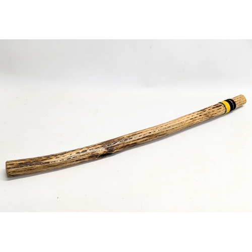 289 - A sundry lot of Aboriginal pieces including a rainstick, boomerangs, etc.