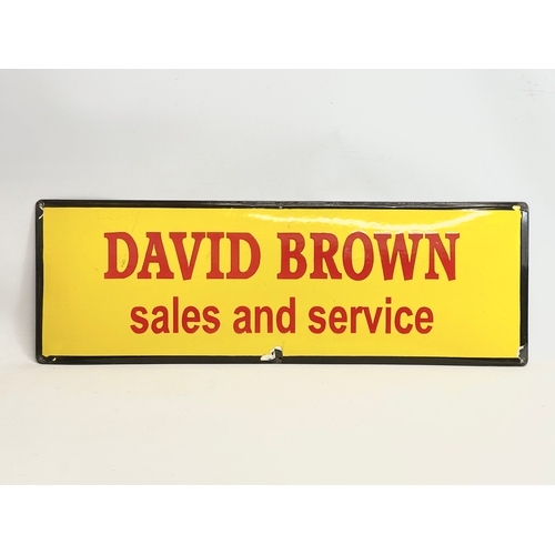 62 - A vintage David Brown enamel sign. Sales and Services. 91.5x30.5cm