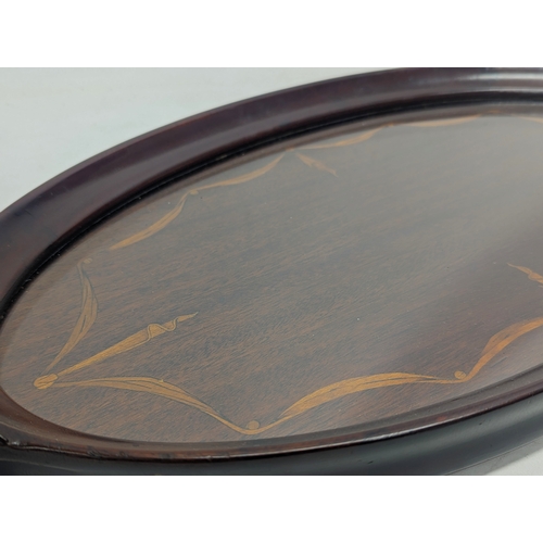 184 - A vintage inlaid tray. 64x34cm