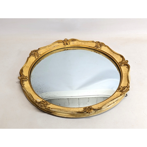 162 - A vintage convex mirror. 48cm