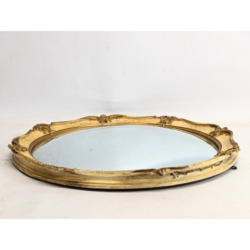 162 - A vintage convex mirror. 48cm