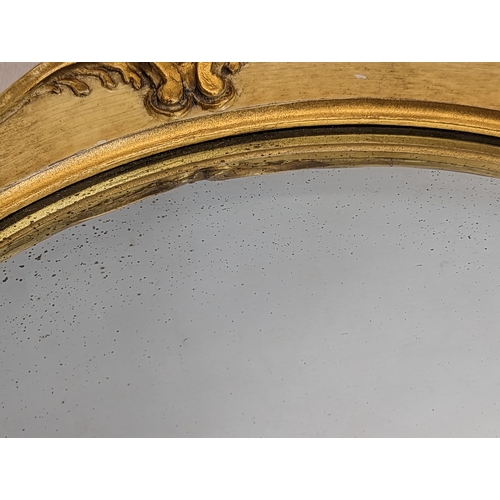 162 - A vintage convex mirror. 48cm