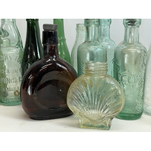 182 - A collection of vintage glass bottles