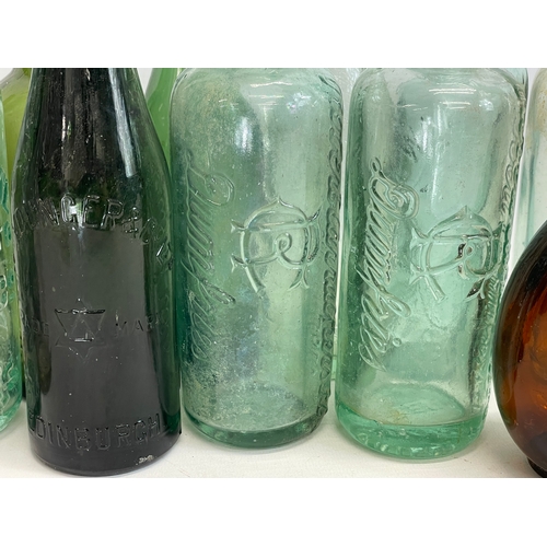 182 - A collection of vintage glass bottles