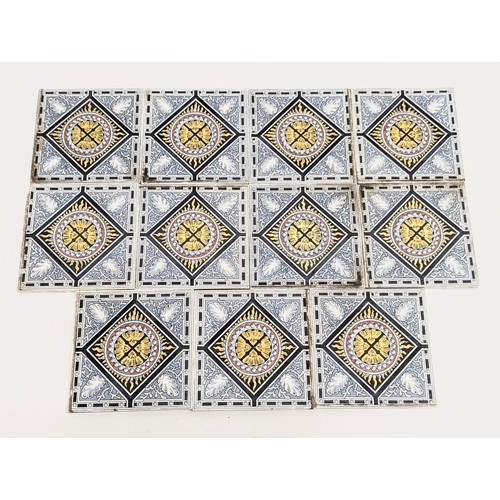 156 - A set of 11 Victorian tiles. 15.5cm