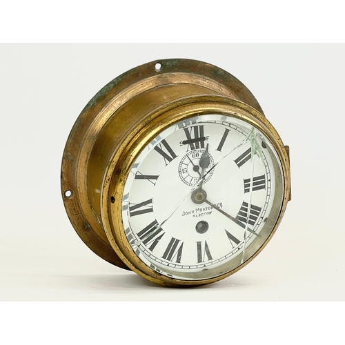 176 - A John Morton & Co, Glasgow brass ships clock. Late 19th/early 20th century. 20.5x9.5cm