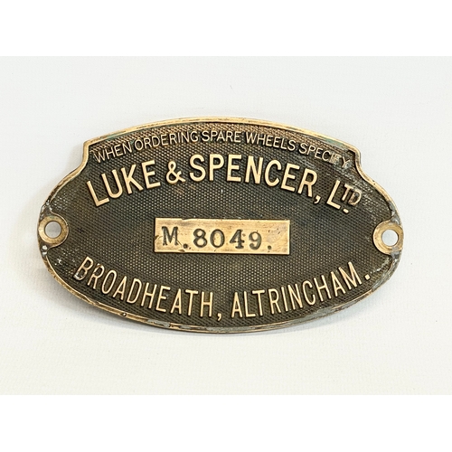 126 - A late 19th/early 20th century Luke & Spencer’s LTD brass sign. M. 8049. 14x8cm