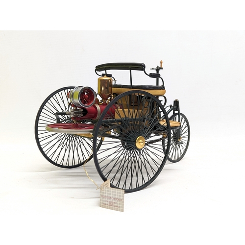 252 - A collectable precision model of 1886 Mercedes Benz Patent Motorwagen by The Franklin Mint. 31.5x18c... 