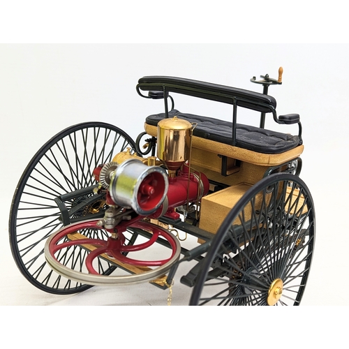 252 - A collectable precision model of 1886 Mercedes Benz Patent Motorwagen by The Franklin Mint. 31.5x18c... 