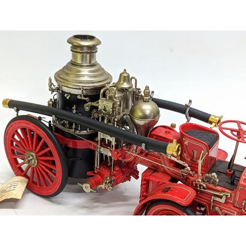 257 - A collectable model of The 1912 Christie Front Drive Steamer by Franklin Mint. 22x12.5cm