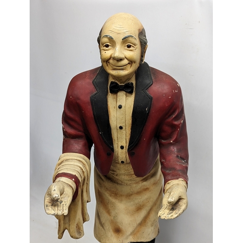 122X - A large butler figure. 97cm