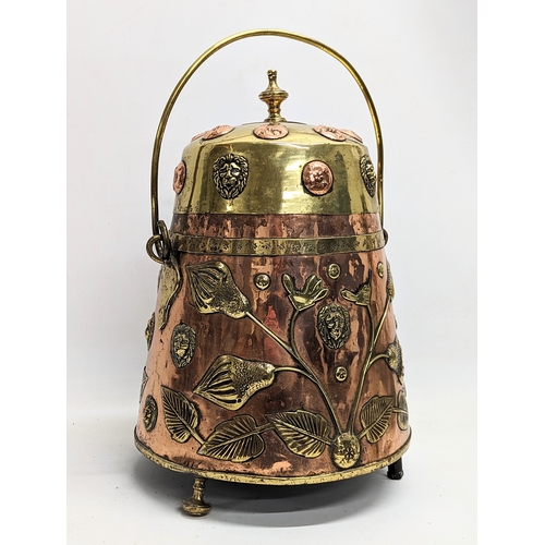 38 - A 19th century brass and copper ash bucket with lid. 46.5cm