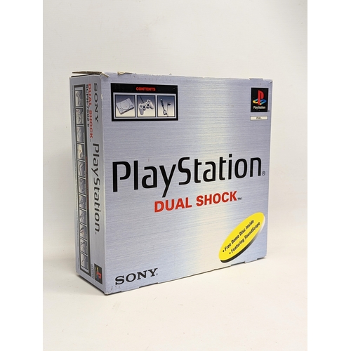 260 - A Sony PlayStation 1 game console 