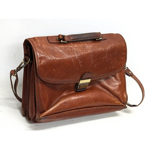 260H - 2 vintage leather bags.