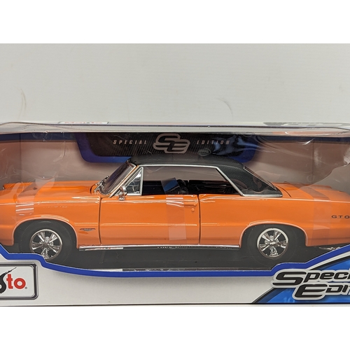 260L - A collectable special edition model car, 1965 Pontiac GTO by Maisto.