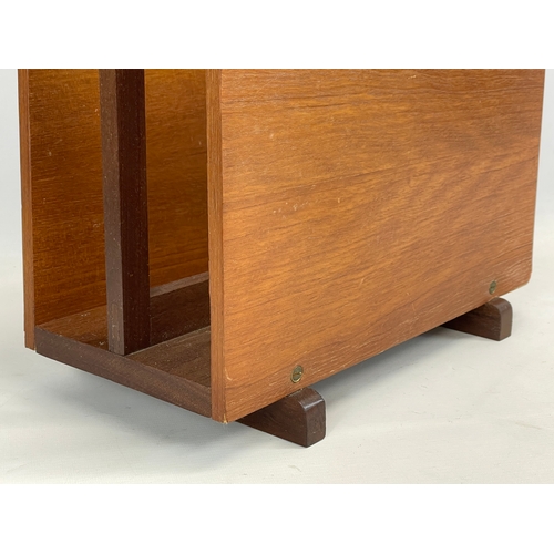 260U - A Mid Century teak magazine rack. 37x17.5x30.5cm